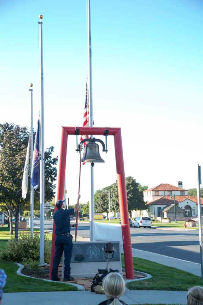 Paramedic Aaron Fuller rings the bell. Photo: Kaye Collins