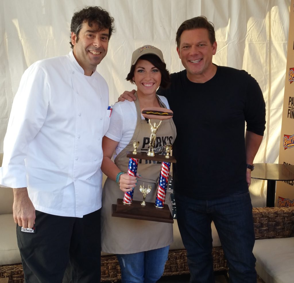 Bulloch with Food Network’s Tyler Florence, holding her award trophy for longest marathon grilling team in the Guinness Book of World Records. Photo courtesy of Susie Bulloch